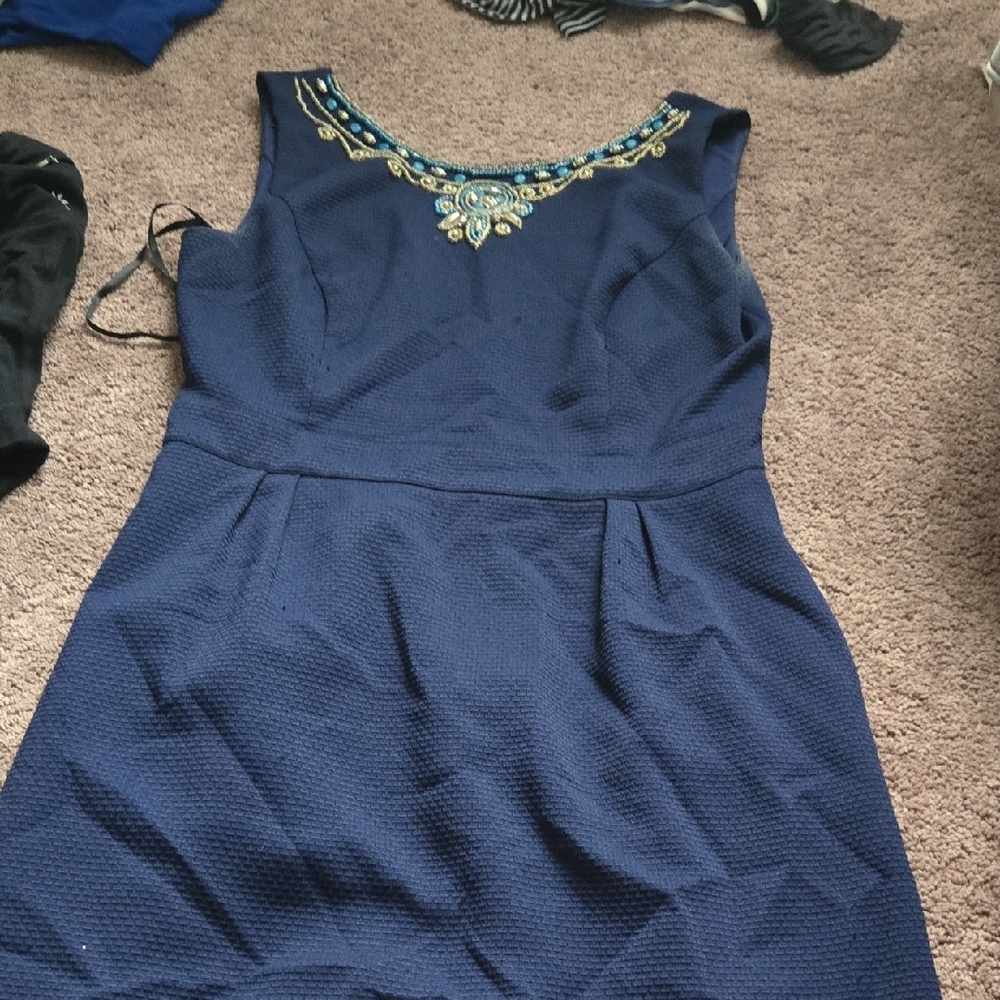 Elegant Navy Blue Dress with Embellished Neckline